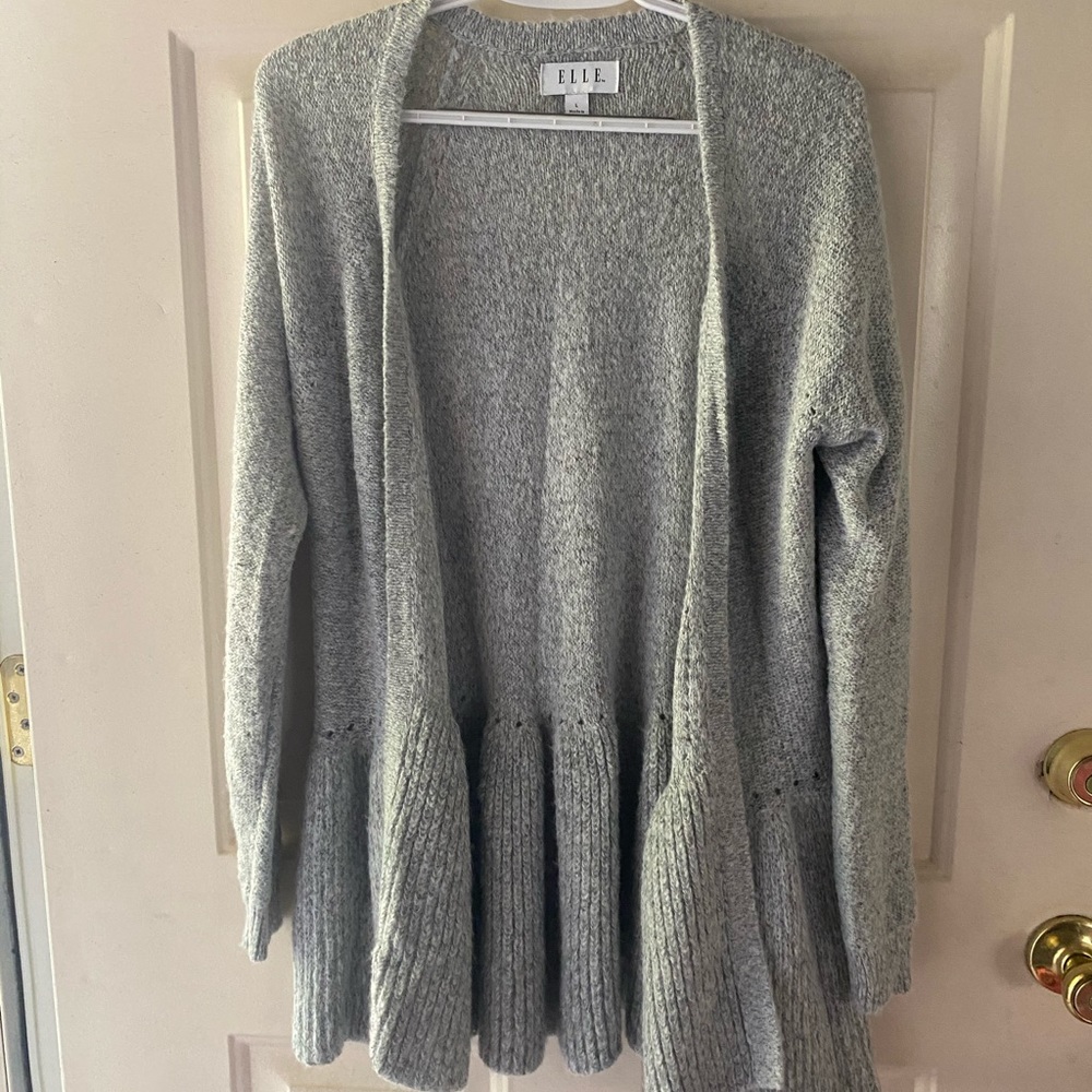 Elle Sweater with Ruffle Bottom.